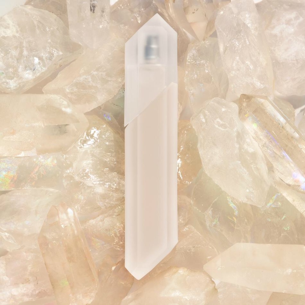 Half full KKW FRAGRANCE CRYSTAL GARDENIA OUD